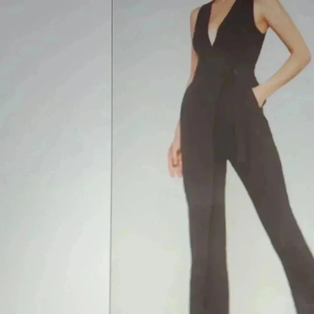 BCBG MAXAZRIA JUMP SUIT SIZE S
